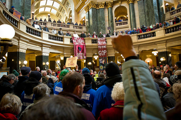 Union members and supporters at the Wisconsin State Capitol on Tuesday. Credit Ben Brewer for The New York Times