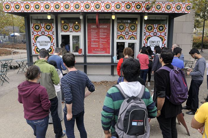 There were long lunch lines at the Conflict Kitchen in Schenley Plaza in Oakland for the first day of its Palestinian menu. Bob Donaldson/Post-Gazette