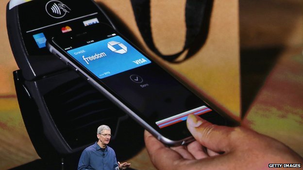 Dwarfed by his own success - CEO Tim Cook and Apple's money making monster