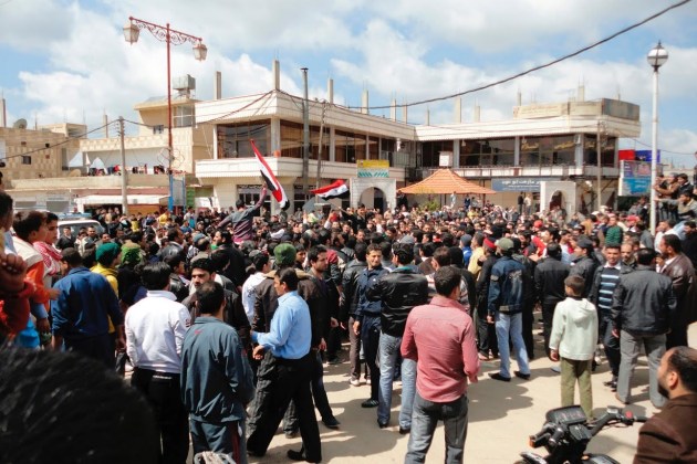  Syrians shout "freedom" during a protest near the city of Deraa. 