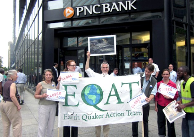 Members of Earth Quaker Action Team protested outside a PNC Bank in 2012 to pressure the bank to end all financing to mountaintop removal coal mining companies. Photo credit: Earth Quaker Action Team