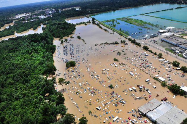 An view from an MH-65 Dolphin helicopter shows flooding and devastation in Baton Rouge, La., Aug. 15, 2016, where service members have rescued residents and provided relief. Coast Guard photo by Petty Officer 1st Class Melissa Leake