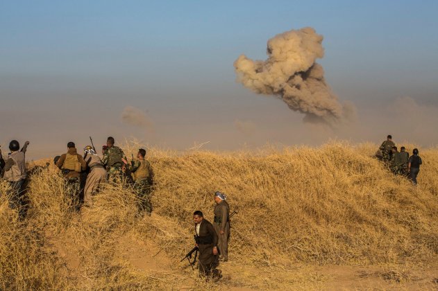  Smoke from a suicide bomber’s destroyed vehicle. Credit Bryan Denton for The New York Times 