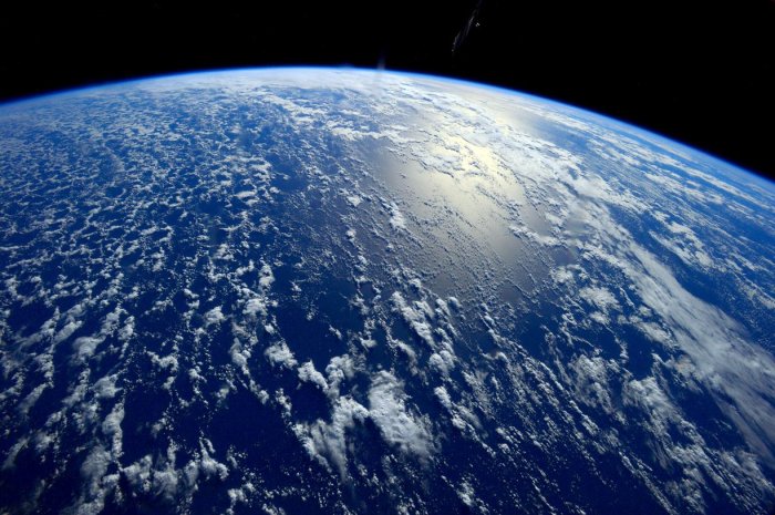 Greenhouse gas emissions caused by humans over the past 45 years have increased the rate of temperature rise to 1.7 degrees celsius per century. Photograph: ISS/NASA[/caption]