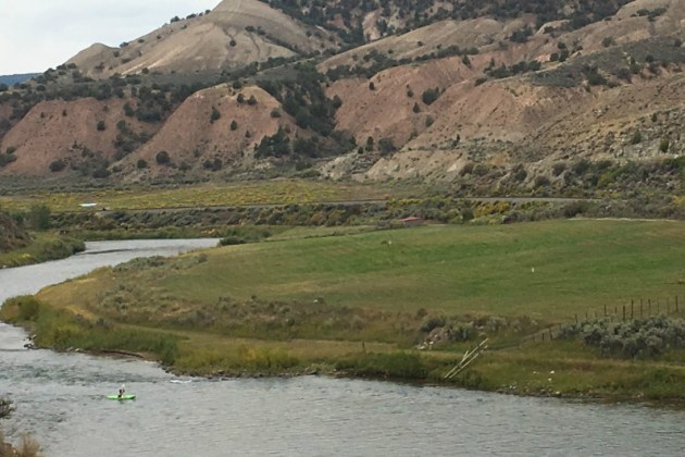  A kayaker paddles upstream on the Colorado River near Dotsero next to a pasture that has been preserved as open space. Jason Blevins, The Denver Post